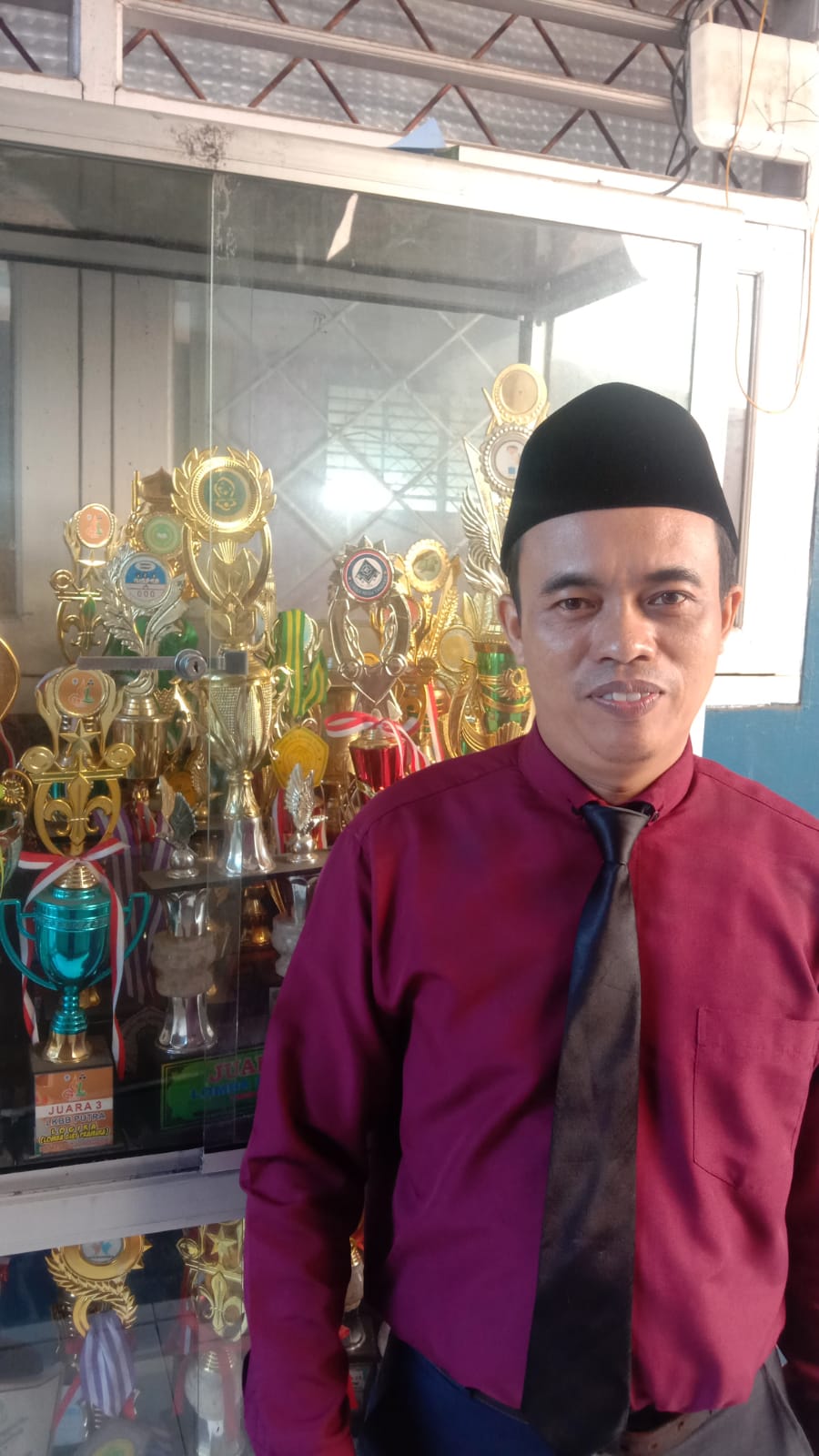 Nasrulloh, S.Pd